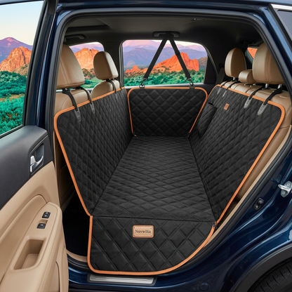 Nuvwllia hammock seat cover installed in a parked vehicle rear seat